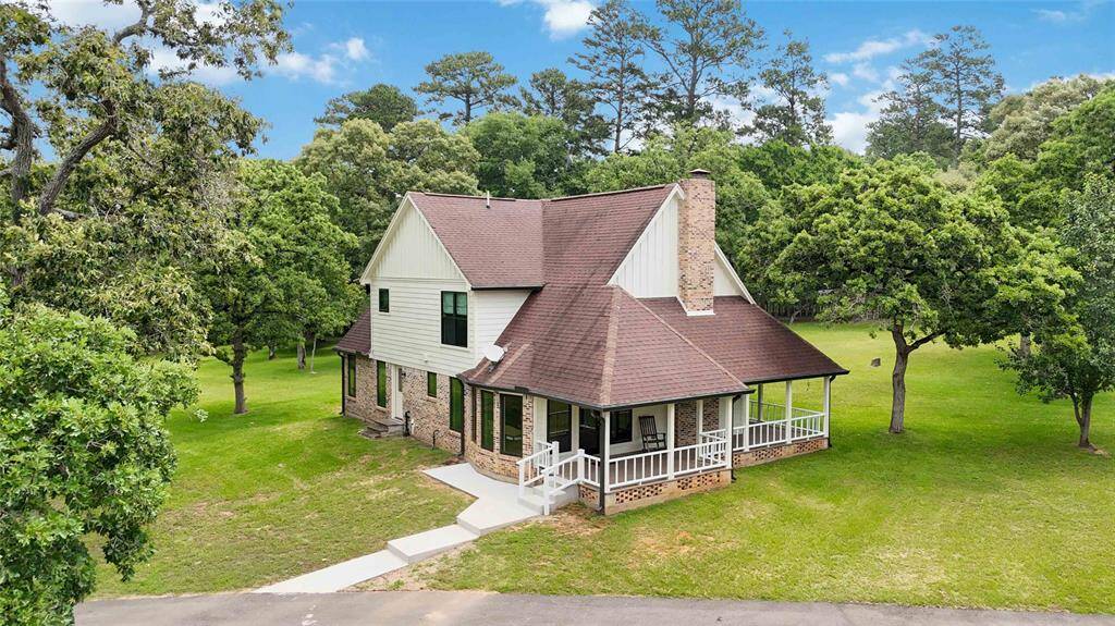 Look at those trees!!! Take a seat anywhere on the wrap-around porch and enjoy the view.
