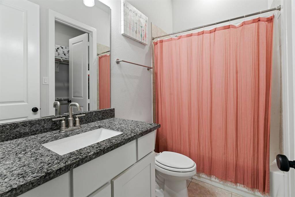 Enjoy the ease of a private en suite with a connected bathroom and walk-in closet—designed to simplify your routine.