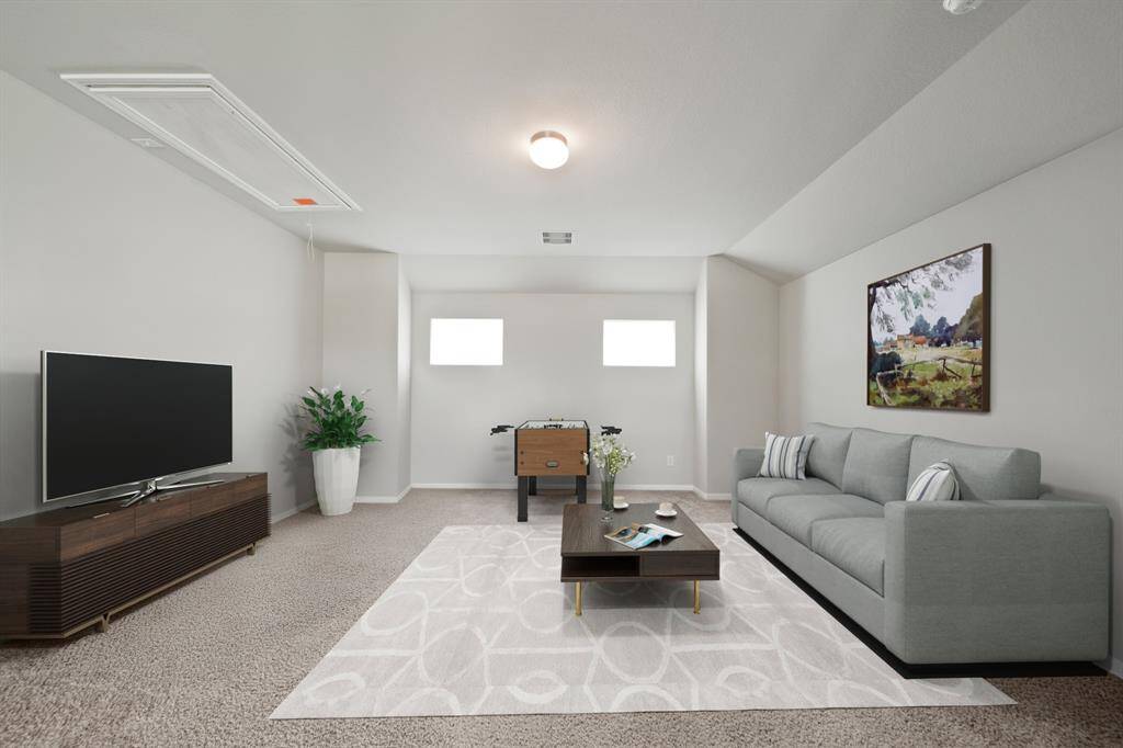 Virtually Staged: Secondary bedroom with carpet floors, and neutral paint.