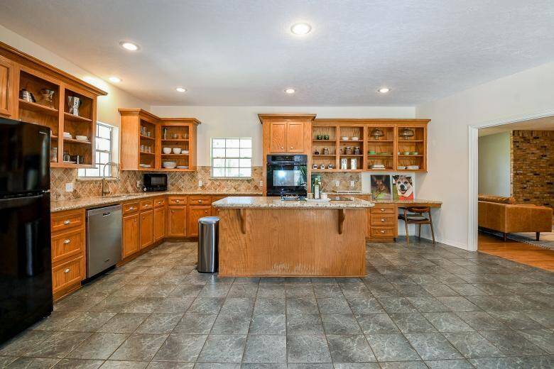 View of the beautiful, open kitchen with large kitchen island.