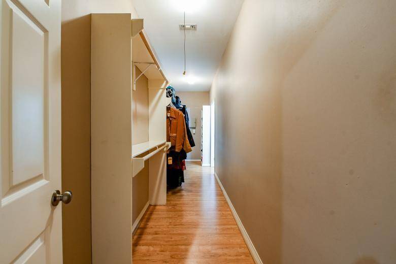 The primary bedroom has an over-sized closet, surely to be able to contain your entire wardrobe and more.