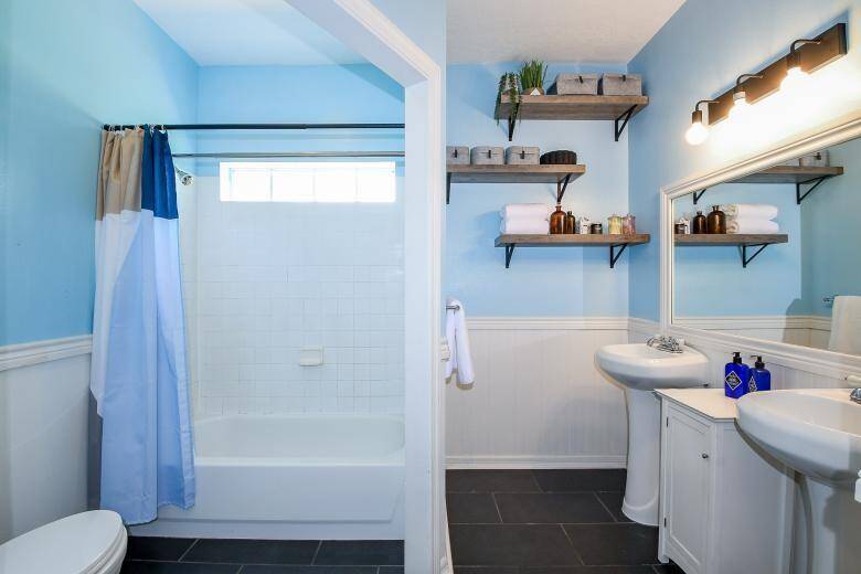 Both of the secondary bedrooms share a Jack and Jill bath with matching pocket doors.