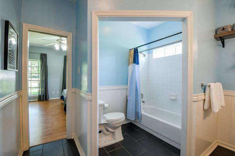 Separate toilet and shower area in the Jack and Jill bath.