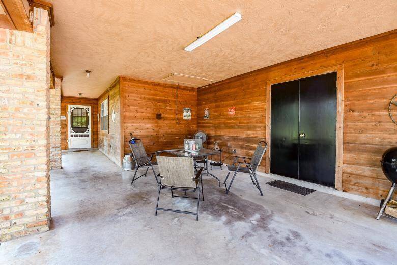 The perfect setting for a party under the covered patio of the second residence.