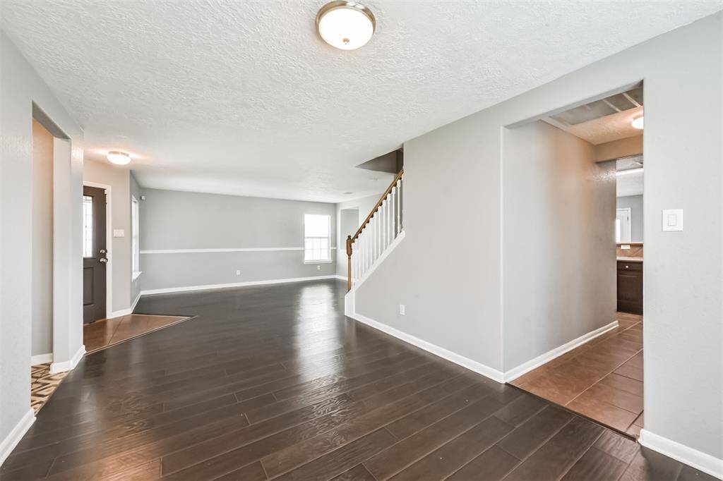 Formal dining is open to the formal living and has access to the kitchen.