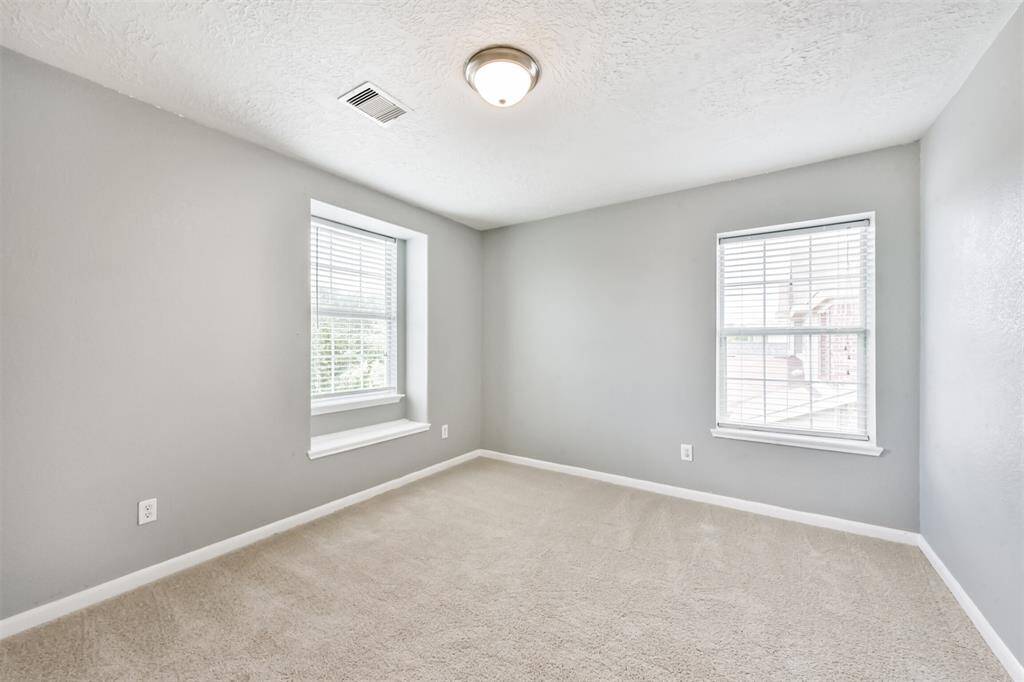 Bright and spacious fourth bedroom.