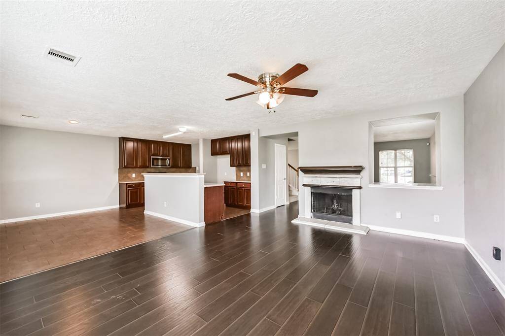 Experience seamless living with the family room flowing into the kitchen.