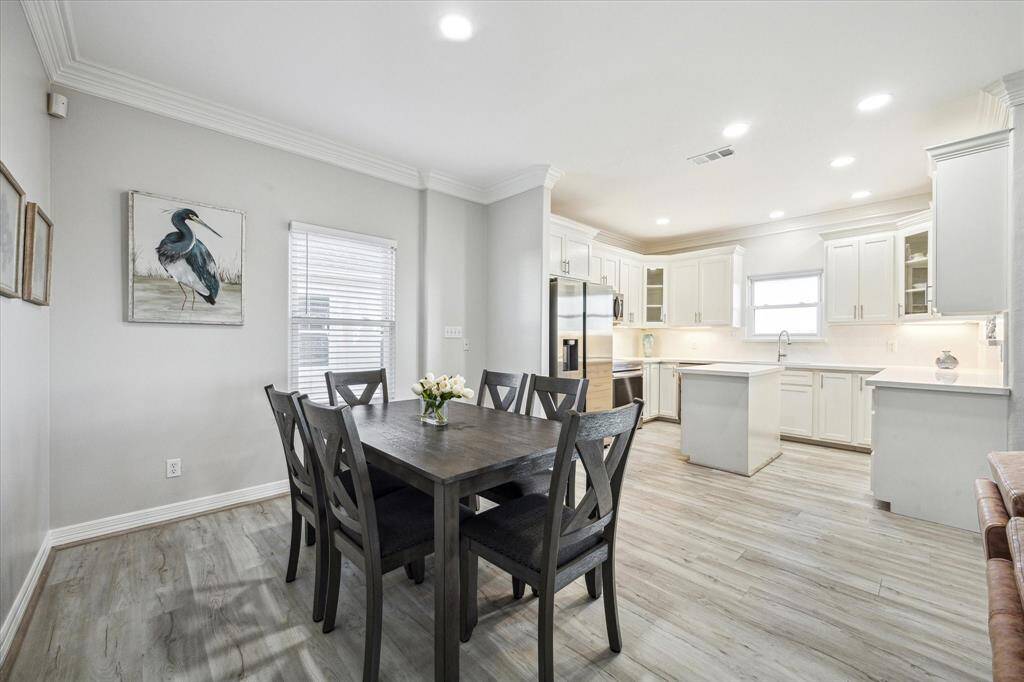 Large dining room, open to the kitchen and living room.