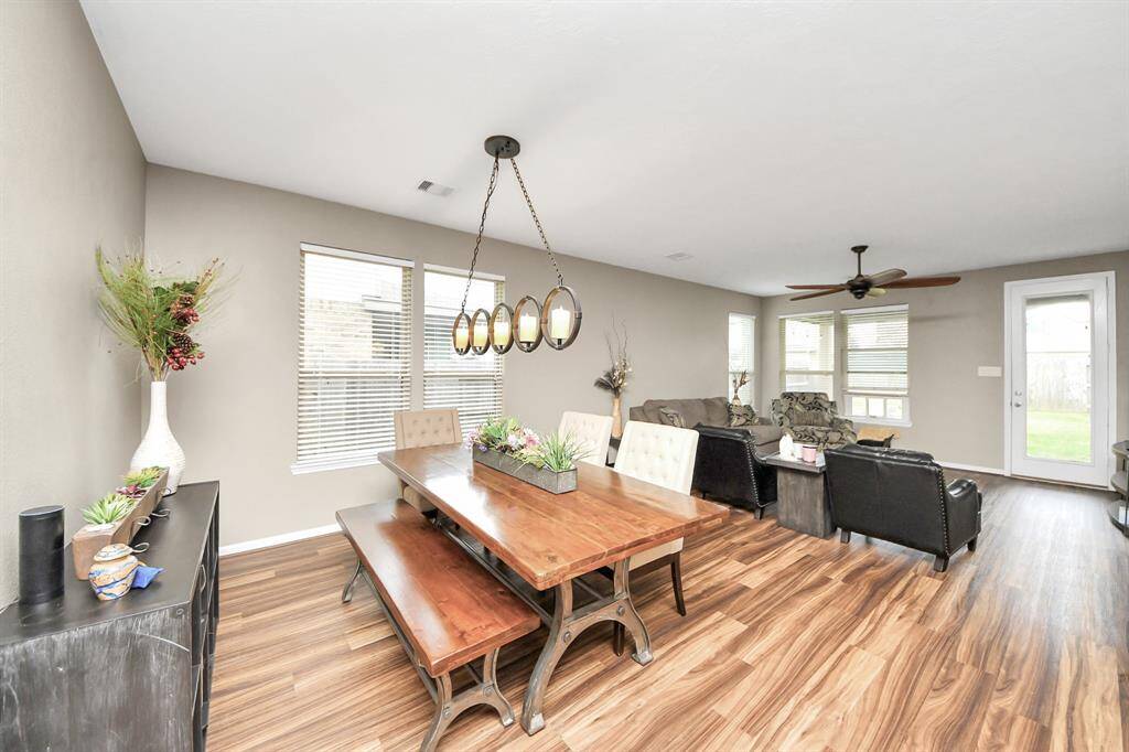 The dining room leads to the living room.