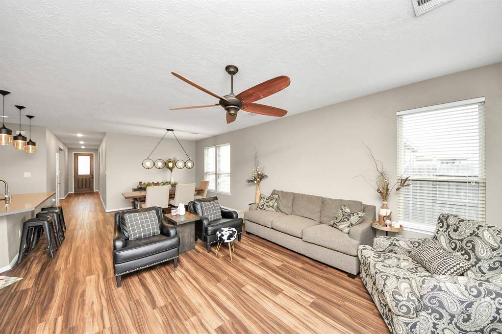 This light and bright spacious livingroom is the perfect layout forentertaining or just relaxing.