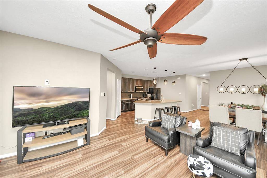 Whether it's simply a night in orentertaining family and friends, thishome has ample open space foreveryone to enjoy.