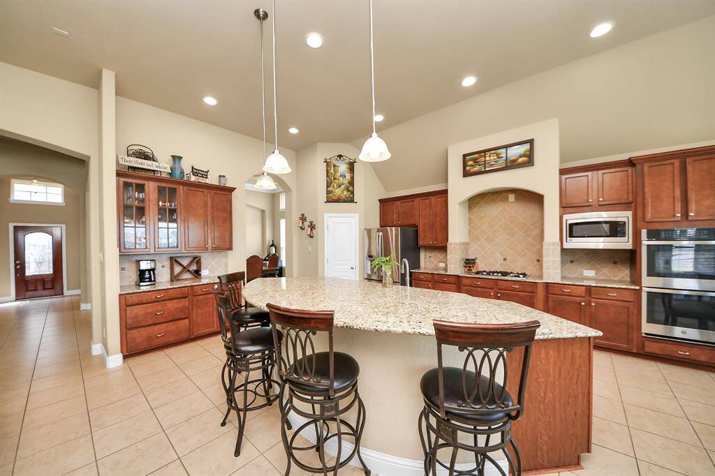 Kitchen with bar seating.