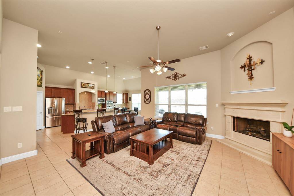 Open living with wall of windows.