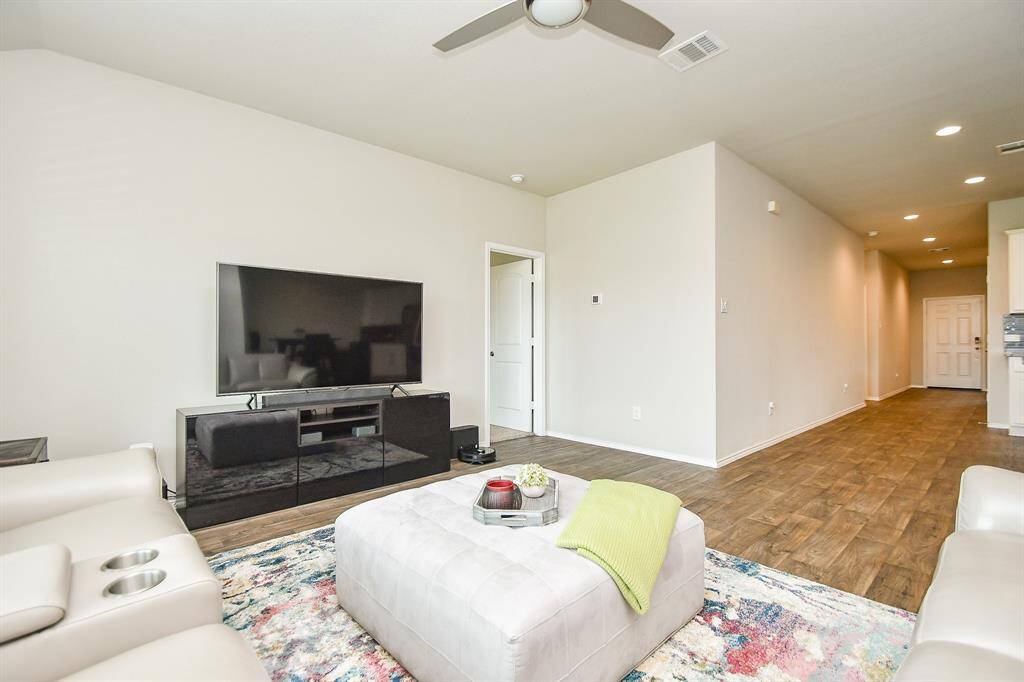 What a great open view from living area, straight down to the front door!