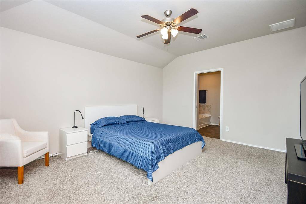 How fabulous is this primary ensuite bedroom/bath?