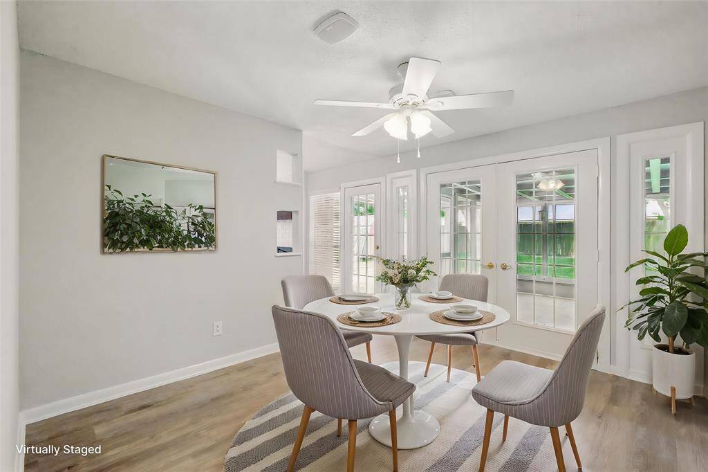 Virtually staged breakfast room.
