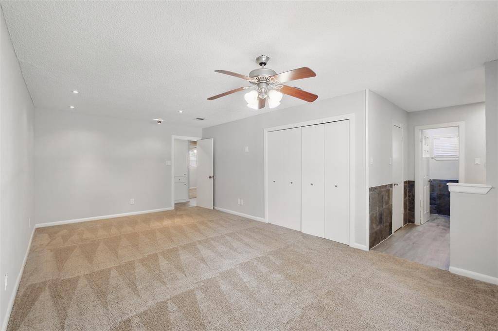Primary bedroom with private bath and 2 closets.  One being the large closet shown and the other a walk-in.