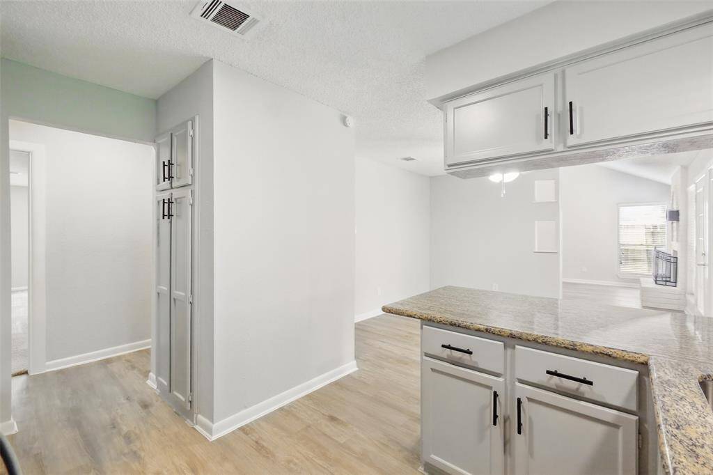 The breakfast bar is perfect for extra seating.