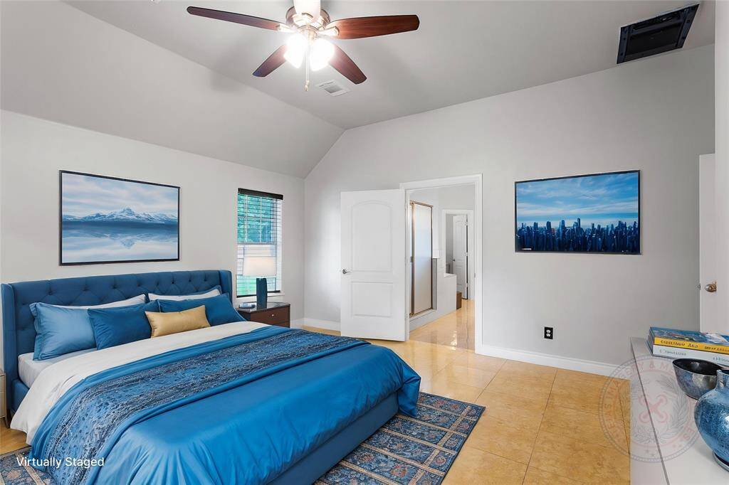 This large primary is virtually staged for you to easily picture your bedroom suit.