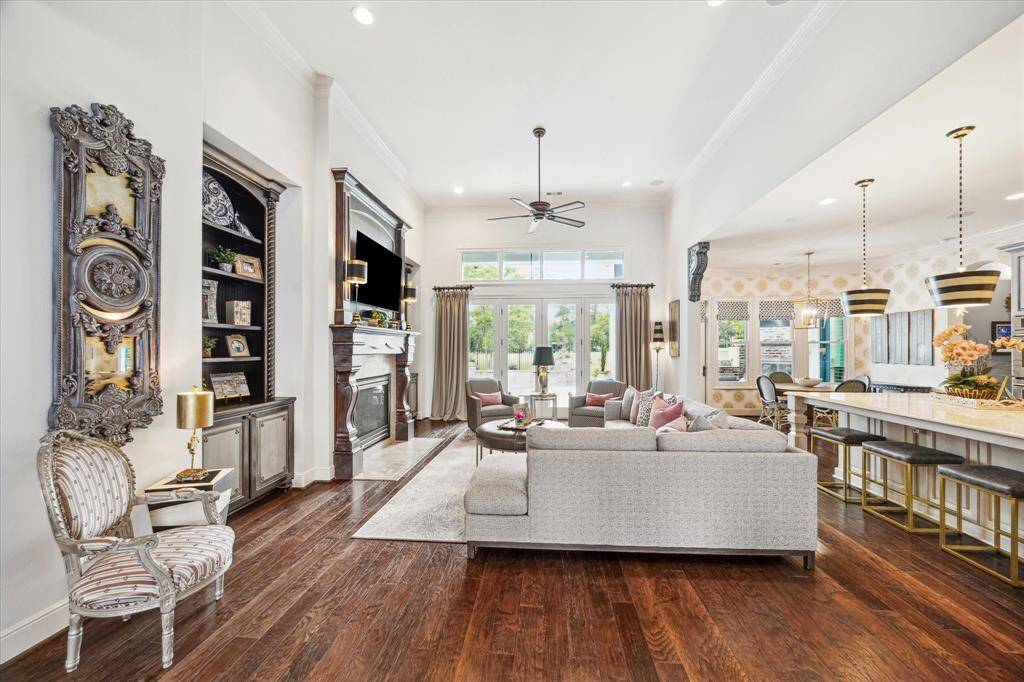 Upon entry there is a direct line of sight from the front door through the foyer and living room to the captivating view beyond.