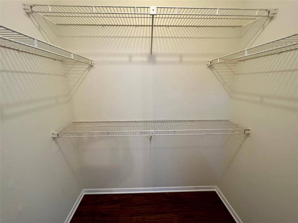 Walk-in closet in bedroom 1.