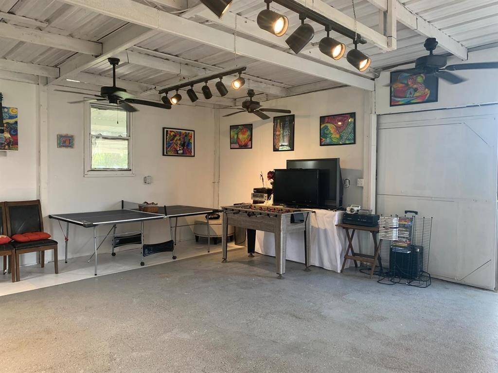 The workspace can be turned into a game room with a large terrace allowing visibility to view the evening sunset