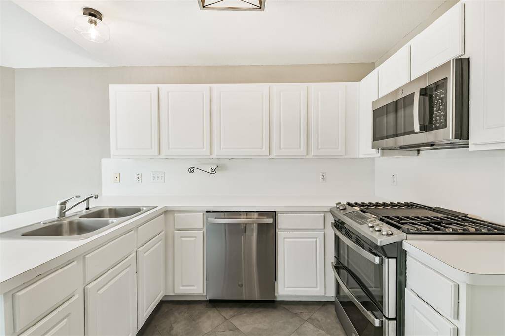 New Appliances:  Fridge, Gas Range, Microwave, Dishwasher
