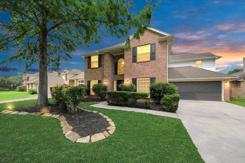 Welcome home to 235 Cedar Elm Lane, located in the master-planned community of New Territory.