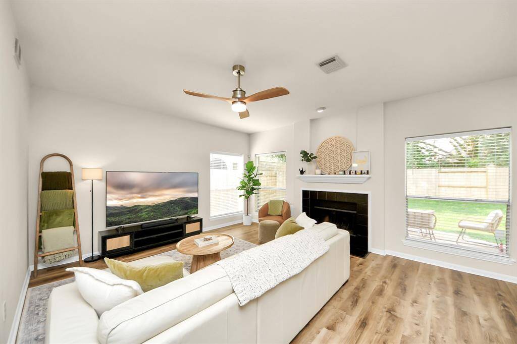 Step into the family room and be captivated by its bright, airy design. Large windows let in an abundance of natural light, while the modern touches create a warm, welcoming atmosphere that makes this space truly shine.