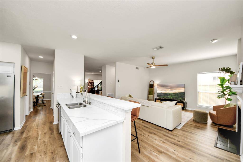 Looking from the kitchen toward the family room, you get a true sense of the open, connected layout that’s perfect for both everyday living and entertaining.