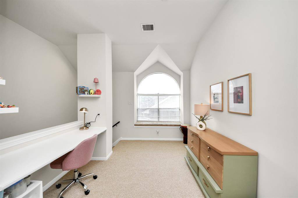 Discover endless possibilities in the versatile bonus room upstairs, easily tailored to fit your unique needs and lifestyle. Whether it’s a dedicated desk area for kids to study or a quiet spot for work, this space offers a built-in desk that adds both function and charm.