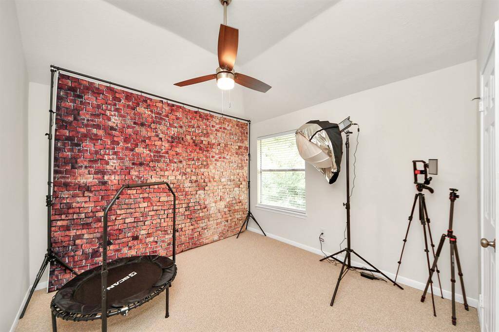 Step into the secondary bedroom, where natural light pours in through a large window, creating a bright and welcoming vibe. With generous space for flexible furniture layouts and a roomy closet for all your essentials, this room is as functional as it is inviting.