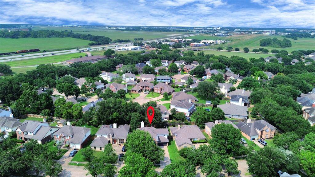 Bird’s-eye view of 235 Cedar Elm Ln, highlighting its prime location—ideally situated near Hwy 90 and the Westpark Tollway for effortless commuting and convenient access to surrounding areas.