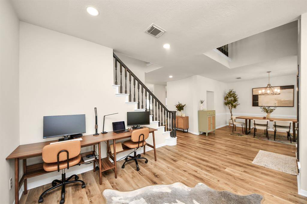 Just to the left as you enter, this bright and open flex space offers endless possibilities. Filled with natural light, it easily adapts to whatever you need—whether that’s a cozy sitting area, a home office, or a playful game room. It’s a versatile spot designed to fit any lifestyle.