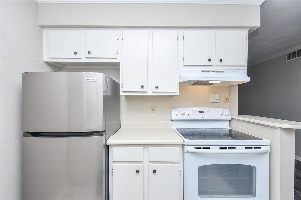 Stainless steel refrigerator included with the unit!