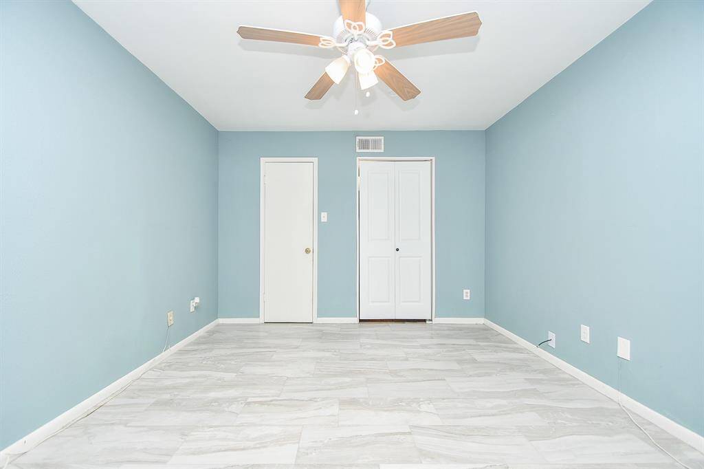 Bi-fold door installed for privacy, separating the primary bedroom from the bathroom!