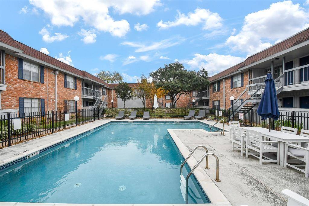 Enjoy a refreshing dip in the pool at your Woodgrove complex!