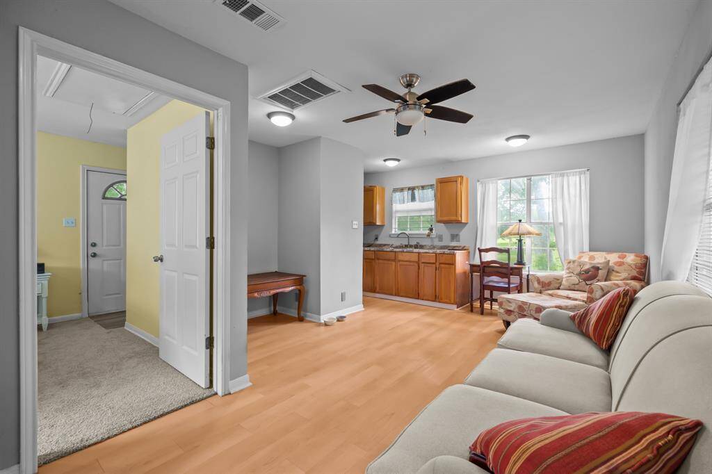 The guesthouse includes a cozy living room.