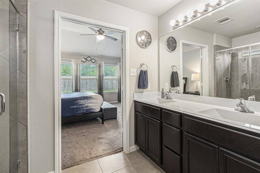 Ensuite features double sinks, an upgraded large walk-in shower and a generous sized walk-in closet.