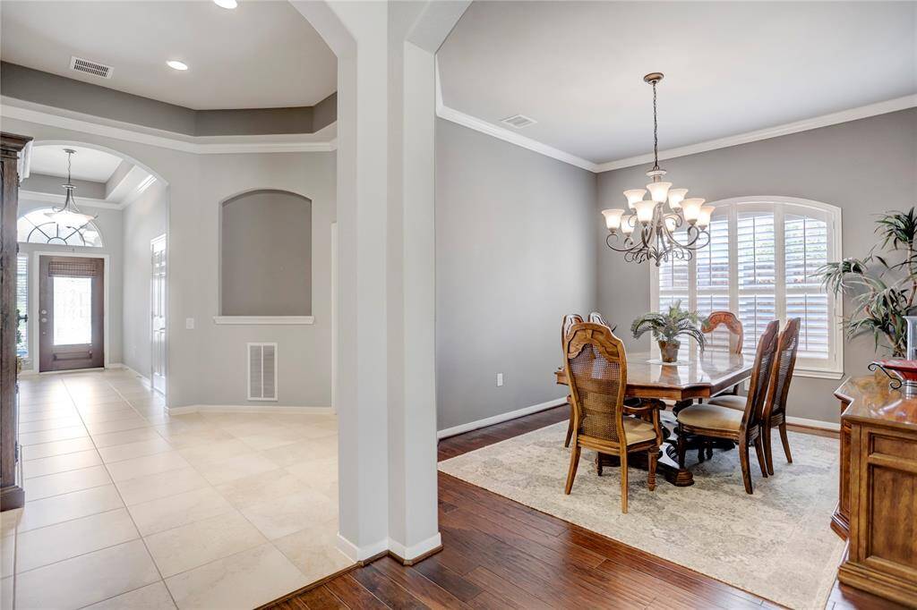 The end of the entry hall seamlessly connects the foyer, dedicated study and formal dining room.
