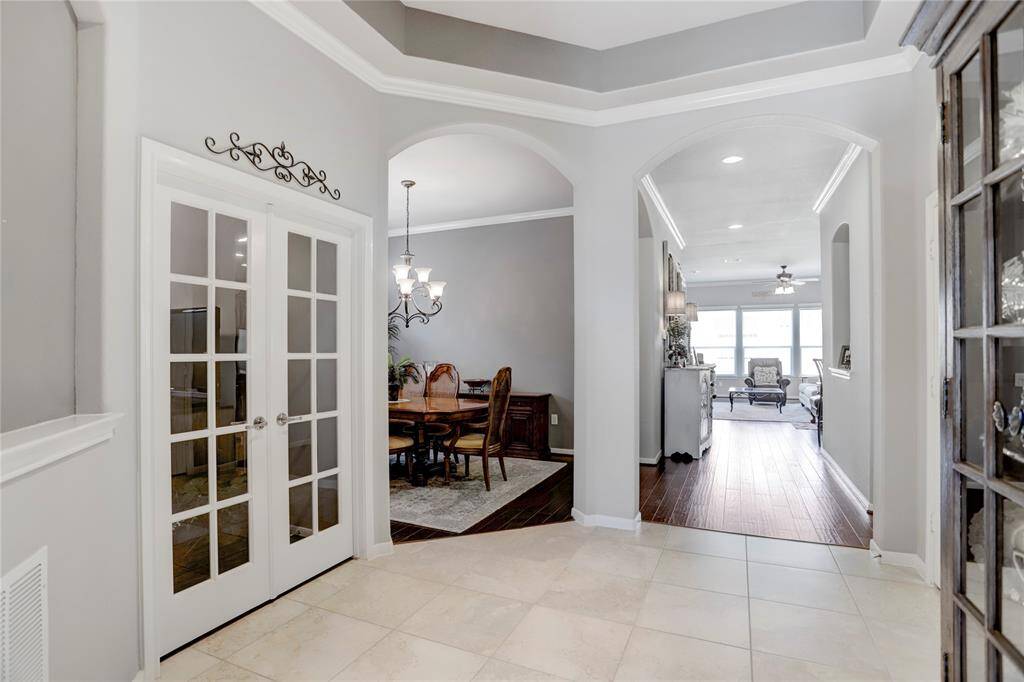 An alternative view of the end of the entry hallway displays the home's excellent flow and abundant light.