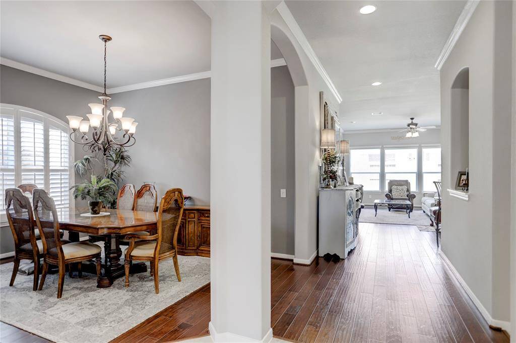 Engineered hardwood floors welcome you into the main common areas of the home from the tiled hallway.