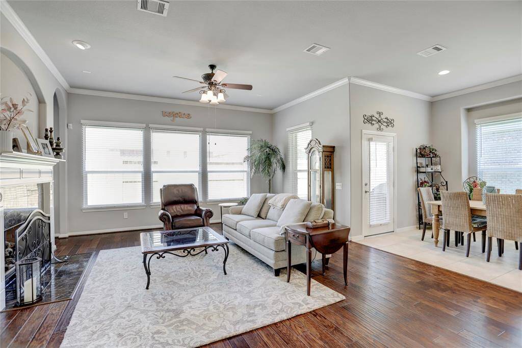 The living area provides ample space for comfortable seating alongside the breakfast area.