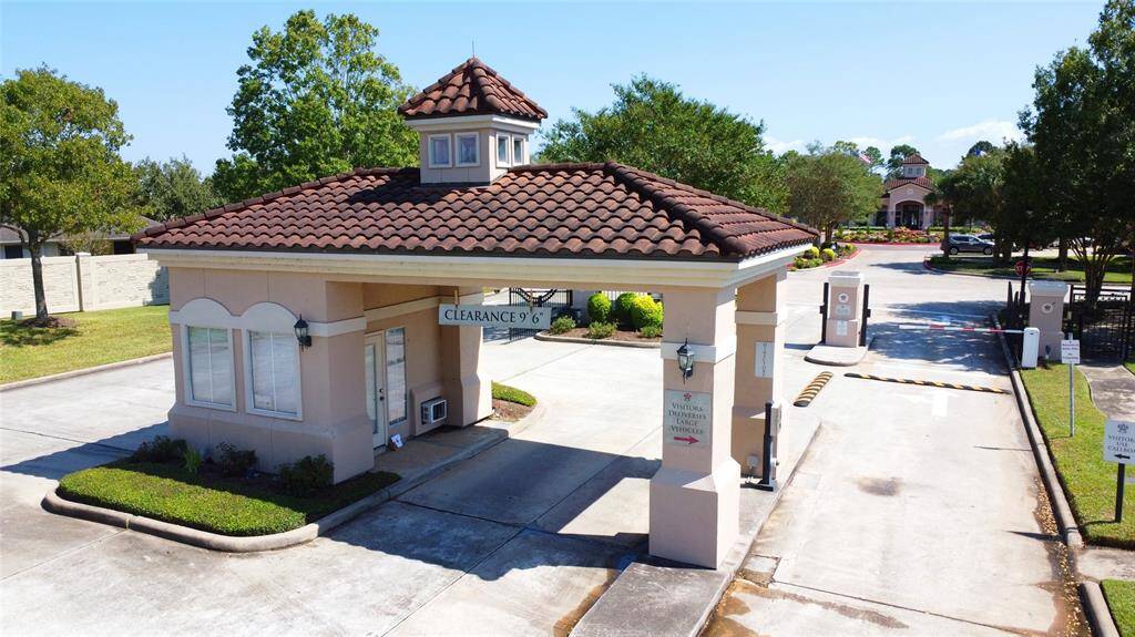 This is a secure gated community entrance featuring a guardhouse and controlled access gates provide the safety and security most residence enjoy in this 55+ community.