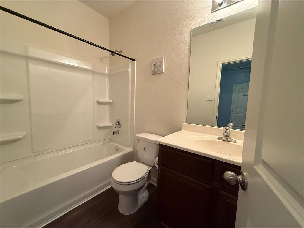 Full Bathroom with tub and shower combination.