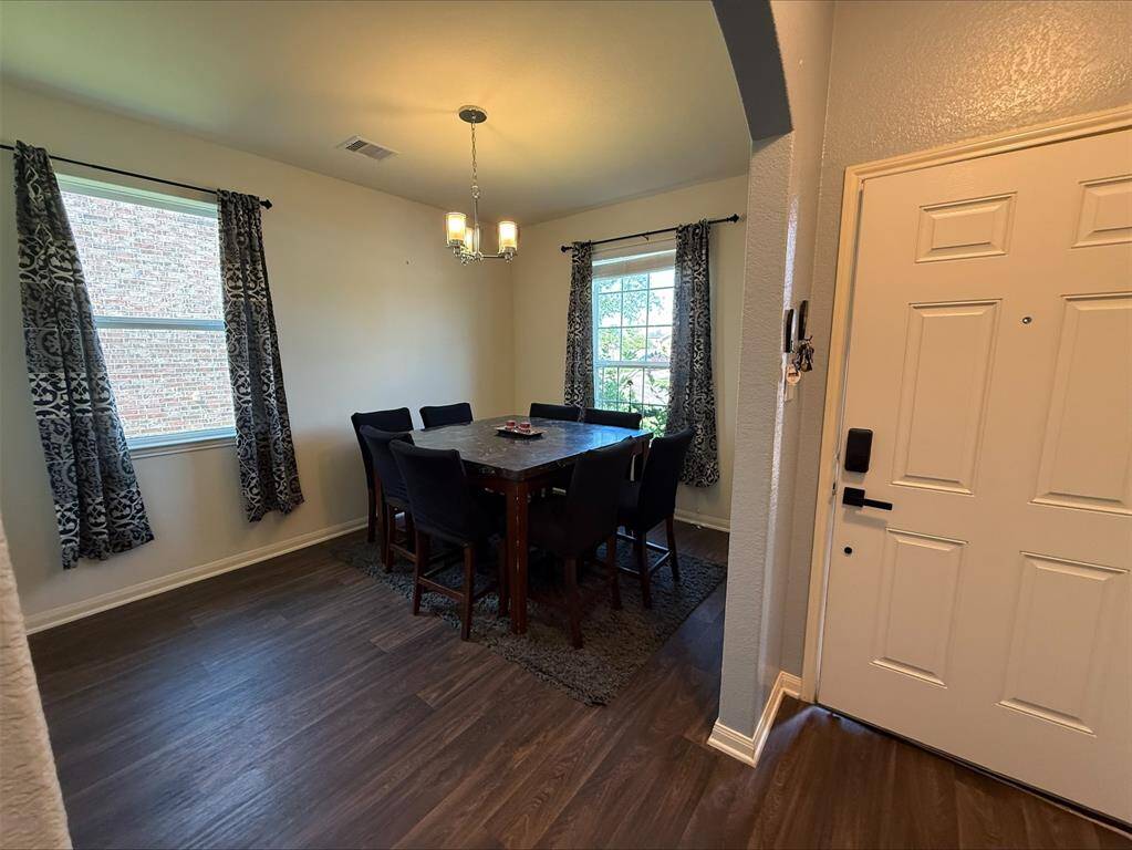 Front entrance and formal dining.