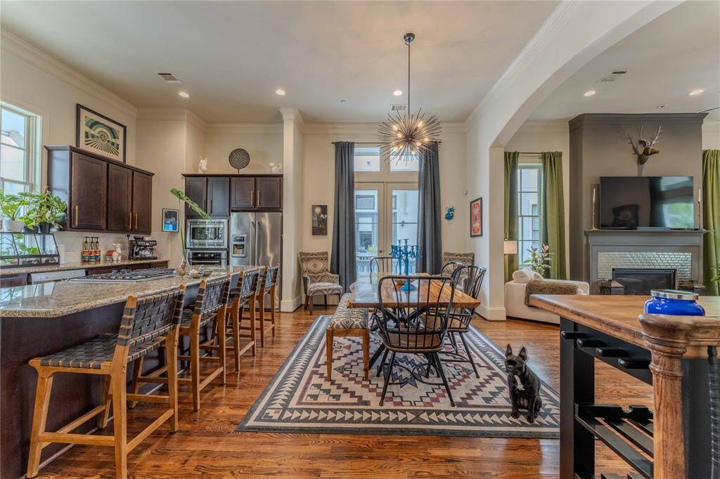 This inviting open-concept luxury is perfect for the everyday or entertaining throughout the year.  Second on this floor is adjacent to the dining room, highlighted with a lovely chandelier.