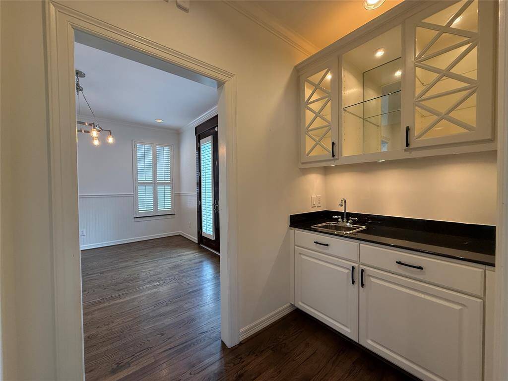 Past the breakfast room is a wet bar.