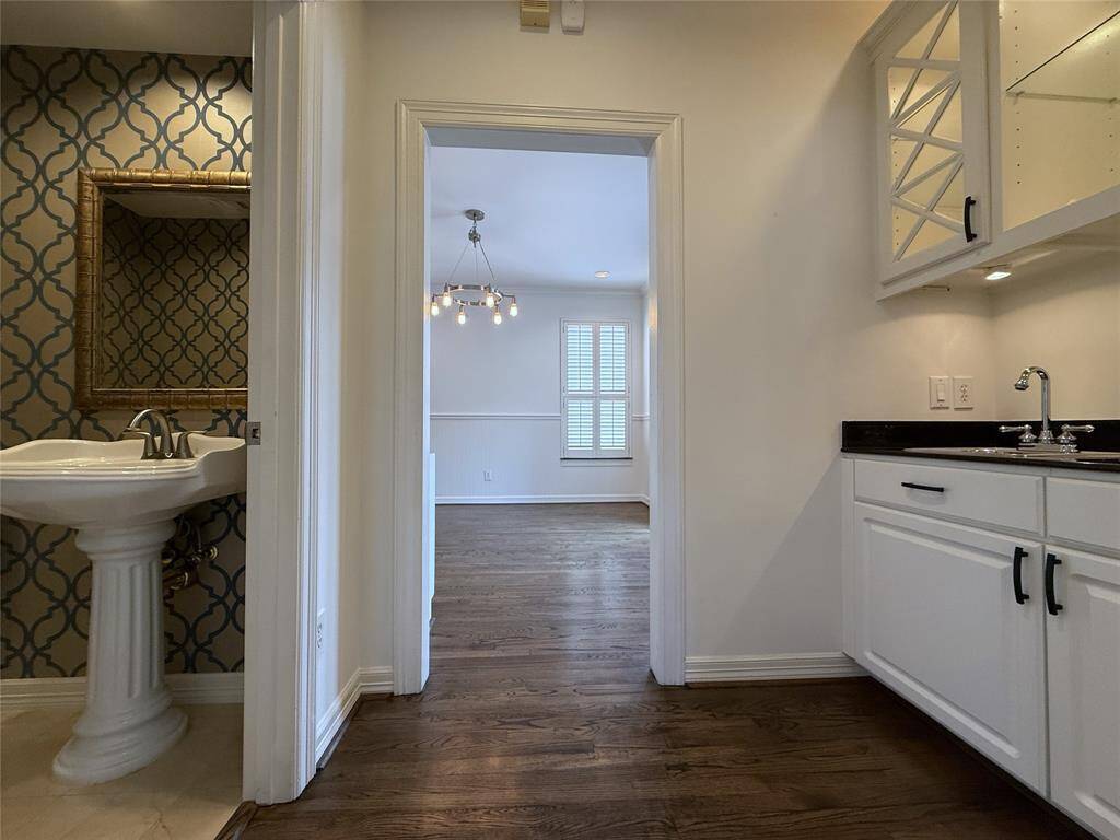 Across from the wet bar is a convenient 1/2 bath.