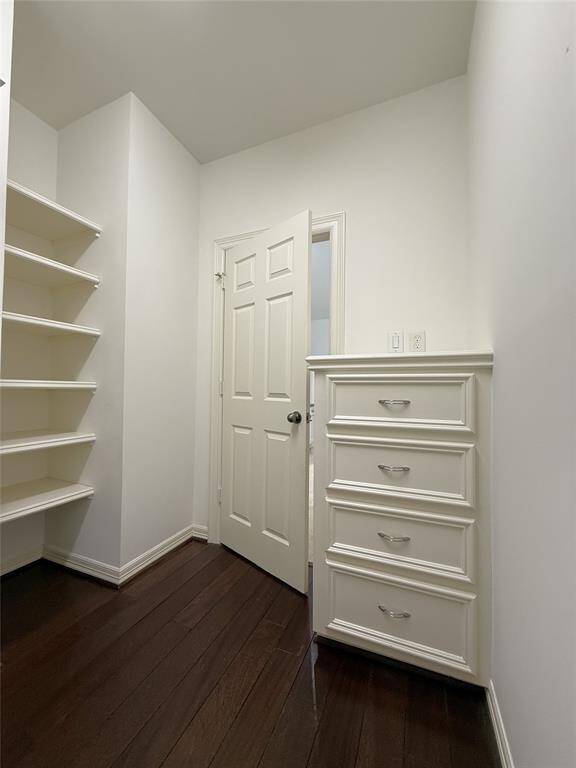 The 2nd  walk-in closet offers built-in drawers & shelves.